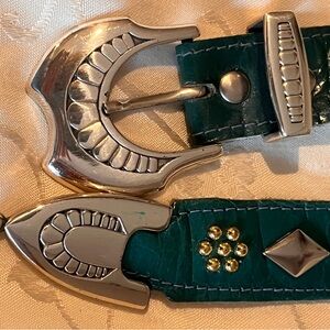 Elegant Green and Silver Belt with Intricate Buckle